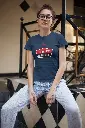 Altra_Automotive_t-shirt-mockup-of-an-alternative-girl-sitting-in-a-vintage-room-25800.webp